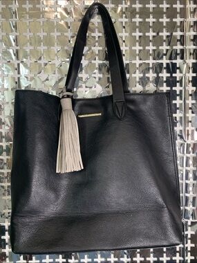 Steve Madden Black Leather Tote with Cream Tassel Accent